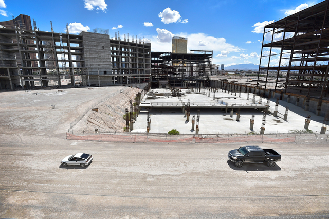 Two vehicles drive by on the construction site of Resorts World Las Vegas along the Strip Monday, May 2, 2016, in Las Vegas. The property, site of Boyd Gaming's mothballed Echelon project, purchas ...