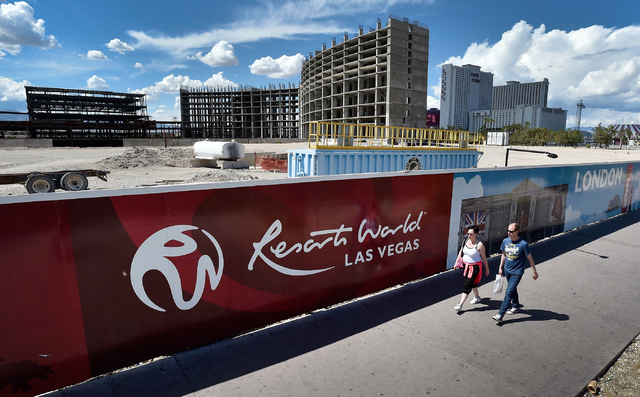 People walk by the construction site of Resorts World Las Vegas along the Strip Monday, May 2, 2016, in Las Vegas. The property, site of Boyd Gaming's mothballed Echelon project, purchased by Mala ...