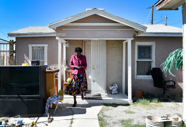 Katherine Duncan, executive director of the Harrison House, walks from a rear cottage at Harrison Guest House Friday, May 13, 2016, in Las Vegas. The Westside neighborhood home was named to the Na ...