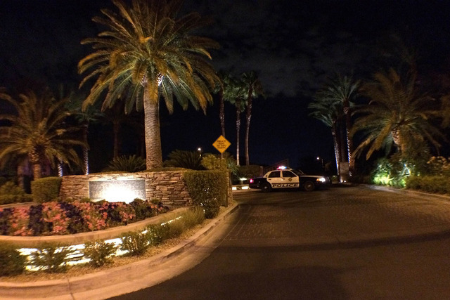 Police guard the entrance of the Talon Pointe gated subdivision near near Town Center and Anasazi drives. Metropolitan Police Department Lt. Charles Jenkins said the initial burglary happened at a ...