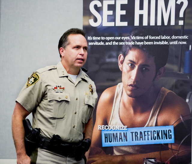Assistant Sheriff Thomas Roberts, of Las Vegas Metropolitan Police Department, prepares to speak during a seminar on human trafficking and child exploitation at Lloyd George U.S. Courthouse in Las ...