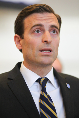 Nevada Attorney General Adam Laxalt speaks with news media about the arrest warrant being issued for Bryan Micon, who ran an illegal poker site which was shut down, at the Sawyer Building in Las V ...