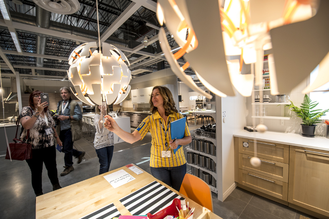 Amy Jensen, the store manager of IKEA Las Vegas, demonstrates a light fixture on Wednesday, May 11, 2016. The new IKEA located near Durango and 215 opens on May 18th. Joshua Dahl/Las Vegas Review- ...