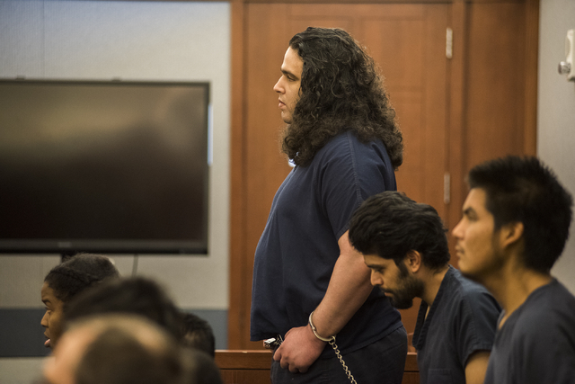 Defendant Joey Kadmiri stands in court during a sentencing hearing the Regional Justice Center in Las Vegas on Thursday, May 26, 2016. Kadmiri is accused in a March 2014 attack on the cast of &amp ...