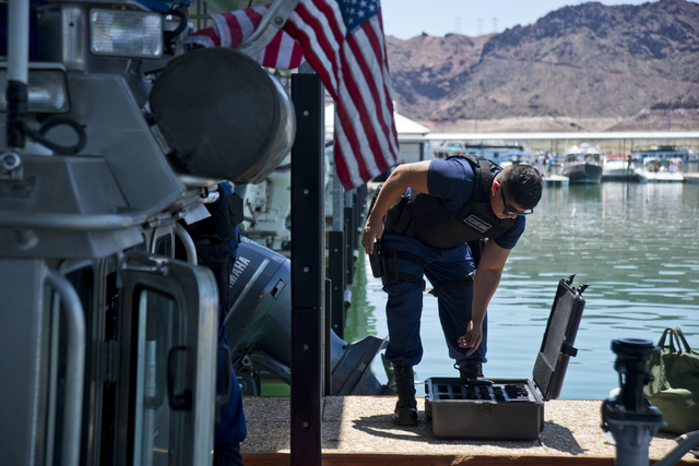 U.S. Coast Guard officer Roman Chapetti loads a boat at the Government Dock at the Las Vegas Boat Harbor on Lake Mead on Friday, May 27, 2016. The coast guard will have a presence at Lake Mead dur ...