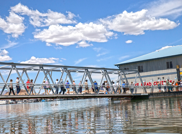 Customers on Lake Mead Cruises walk across the bridge towards their boat at Lake Mead National Recreation Area, Wednesday, May 18, 2016, in Boulder City, Nevada. Benjamin Hager/Las Vegas Review-Jo ...