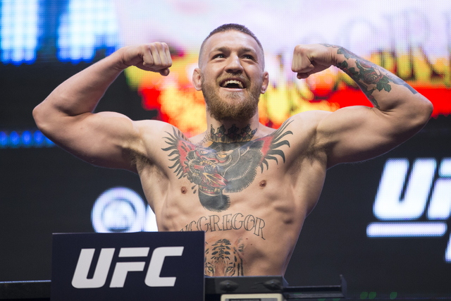 UFC featherweight champion Conor McGregor poses for a portrait during...