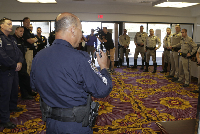 Sgt. Charles Lee of Nevada Highway Patrol speaks during a briefing inside the NHP substation in Jean on Friday, May 27, 2016. The Nevada Highway Patrol and California Highway Patrol joined forces  ...