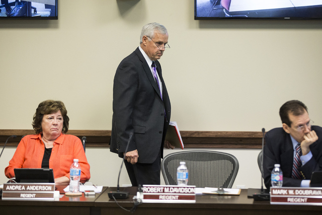 Chancellor Dan Klaich walks to his seat after speaking during a special meeting by the Board of Regents at the Nevada System of Higher Education building on Thursday, May 12, 2016, in Las Vegas. T ...