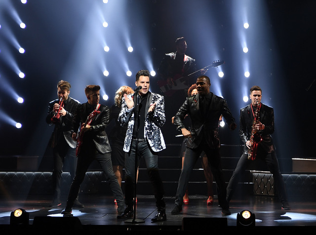 Frankie Moreno and his band show some fancy footwork in Moreno's new Planet Hollywood showcase. (Photo by Denise Truscello/WireImage )