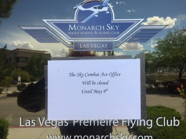 A note taped to the entrance Monday, for Sky Combat Ace and Monarch Sky offices near Henderson Executive Airport says Sky Combat Ace's office will be closed until May 9. A Sky Combat Ace instructo ...