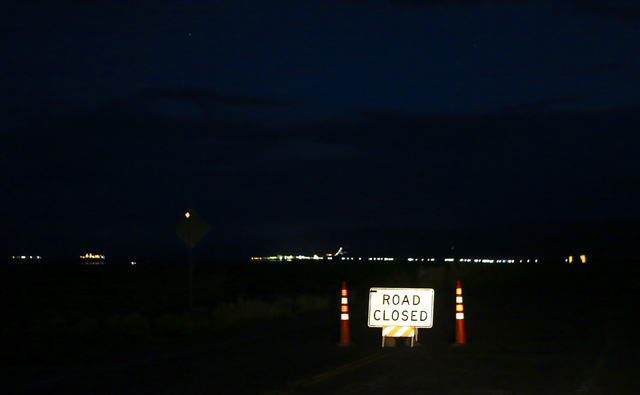 A road closure sign is shown along Las Vegas Boulevard near Jean, Nev. after a single engine airplane crashed, leaving two dead, near the area on Saturday, April 30, 2016. Chase Stevens/Las Vegas  ...