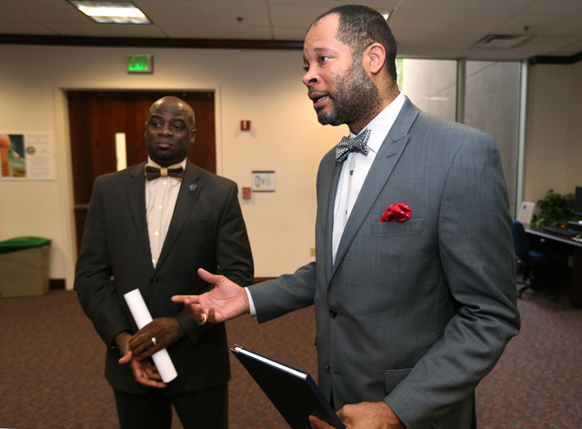 Nevada Senate Democrats Kelvin Atkinson, left, and Aaron Ford talk Friday night about a measure that would appropriate $1.3 million to equip Nevada Highway Patrol troopers with body cameras by 201 ...