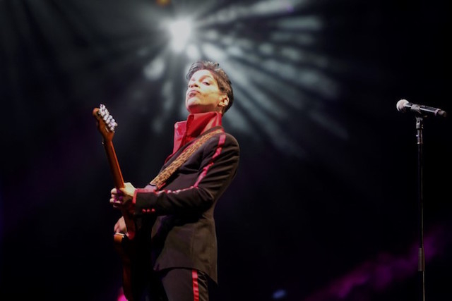 Prince performs on stage at Yas Arena in Yas Island, Abu Dhabi, Nov. 14, 2010. (Jumana El-Heloueh/Reuters)
