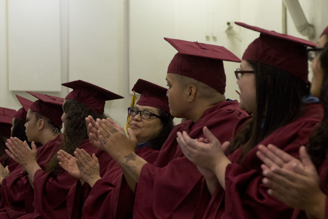 Inmates applaud prior to receiving their high school diplomas during Florence McClure Women's Correctional Center's graduation ceremony in Las Vegas on May 25, 2016. (Bridget Bennett/Las Vegas Rev ...