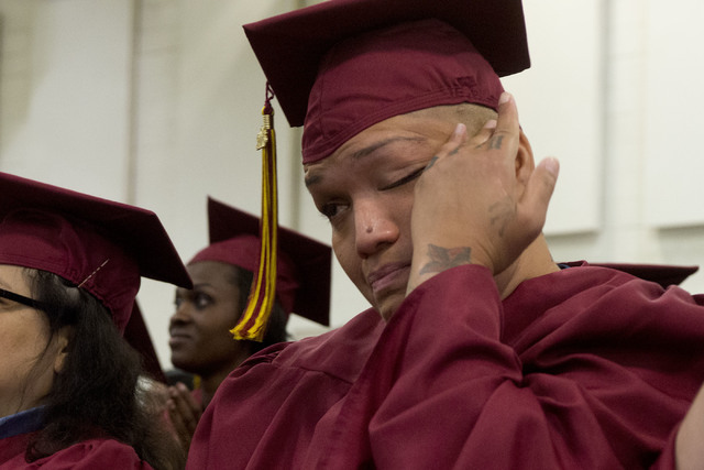Inmate Sesha Awa wipes tears from her eyes during Florence McClure Women's Correctional Center's graduation ceremony in Las Vegas on May 25, 2016. (Bridget Bennett/Las Vegas Review-Journal) Follow ...