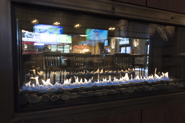The fireplace at the soon to be opened PT's Ranch at 6450 S. Durango Dr. in Las Vegas is seen Thursday, May 19, 2016. The tavern, slated to open Thursday, May 26, 2016, will be the 50th launched b ...