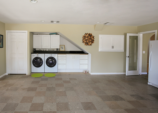 The large laundry room of the 3,426-square-foot home in Bonnie Springs. (ELKE COTE/MILLIONS)