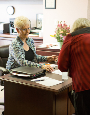 Shirley Hildreth, left, greets Katrina Steiner as she signs in prior to a presentation by Dr. Marc Baxter at the Stillpoint Center for Spiritual Development at 8072 W. Sahara Ave. in Las Vegas Sat ...