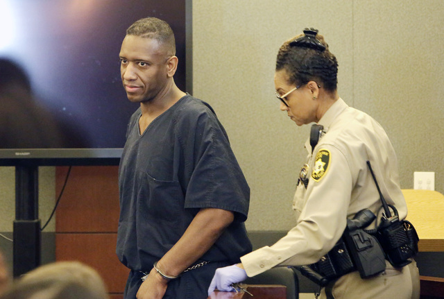 Bobby Richards, who was convicted of murdering his wife, Bronwyn Richards, is led out of the courtroom after he was sentenced to life without parole on Thursday, May 5, 2016, at the Regional Justi ...
