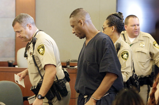 Bobby Richards, who was convicted of murdering his wife, Bronwyn Richards, is led out of the courtroom after he was sentenced to life without parole on Thursday, May 5, 2016, at the Regional Justi ...
