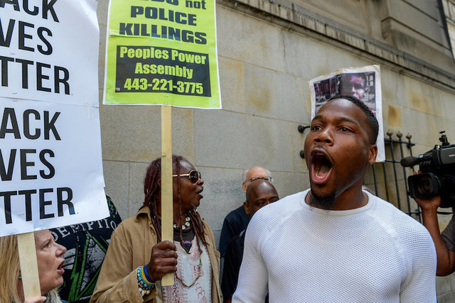 Protesters react as Baltimore police officer Edward Nero (not pictured) was acquitted of all charges in the 2015 death of Freddie Gray, outside a courthouse in Baltimore, Maryland, U.S., May 23, 2 ...