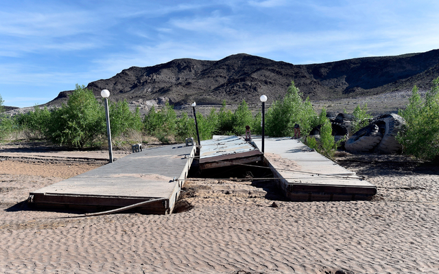 Boat docks are seen out of the water at the Echo Bay Marina Tuesday, April 26, 2016, at the Lake Mead National Recreation Area. Water officials in Nevada, Arizona and California have negotiated a  ...