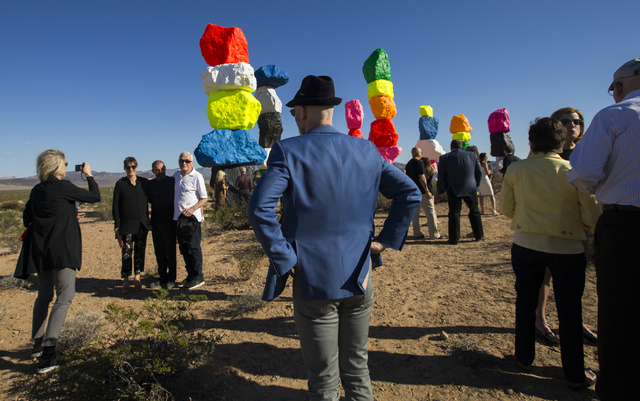 Over 200 people from around the country attended the ribbon cutting ceremony for the Seven Magic Mountains art project, Monday, May 9, 2016, near Jean Dry Lake, Nevada. The project is the work of  ...
