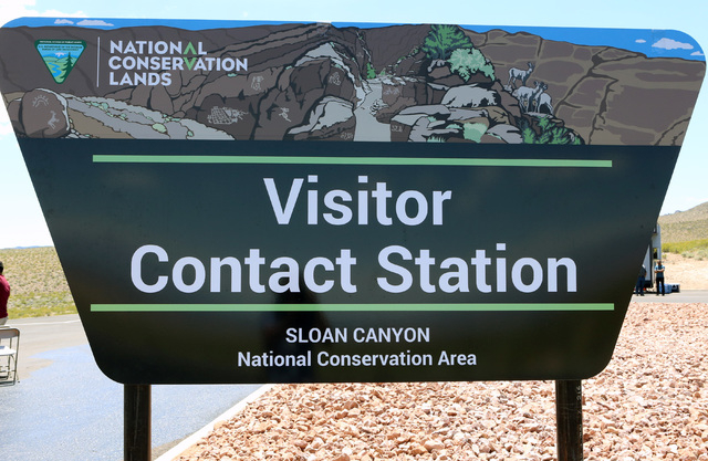 Visitor's Contact Station sign is seen at Sloan Canyon National Conservation Area on Thursday, May 19, 2016. The BLM Thursday dedicated the first paved access to the area and other visitor ameniti ...