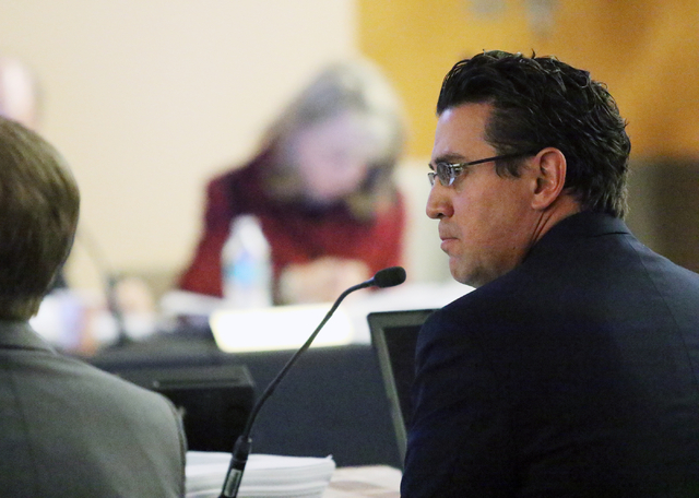 Jeremy Aguero, principal of Applied Analysis, delivers a stadium proposal during a meeting of the Southern Nevada Tourism Infrastructure Committee at UNLV's Stan Fulton Building Thursday, May 26, ...
