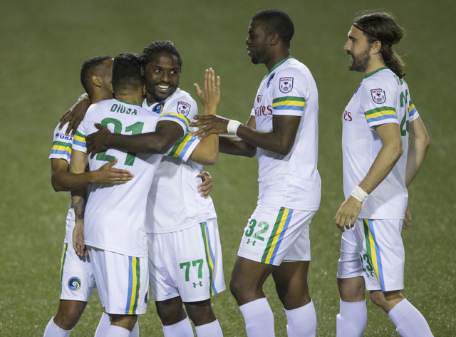 New York Cosmos' Lucky Mkosana (77) celebrates with teammates after after beating SD Eibar, Wednesday, May 25, 2016, at Sam Boyd Stadium in Las Vegas. Benjamin Hager/Las Vegas Review-Journal