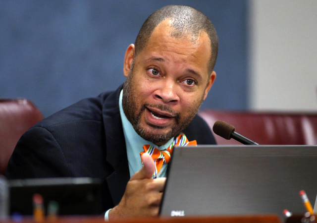 Nevada state Sen. Aaron Ford, D-Las Vegas, works in committee at the Legislative Building in Carson City in 2015. (Cathleen Allison/Associated Press)