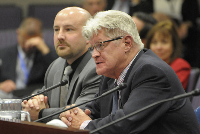 Nevada's Assistant State Controller Geoffrey Lawrence, left, and State Controller Ron Knecht present an alternative tax plan to Gov. Brian Sandoval's plan during a budget hearing Thursday, May 14, ...
