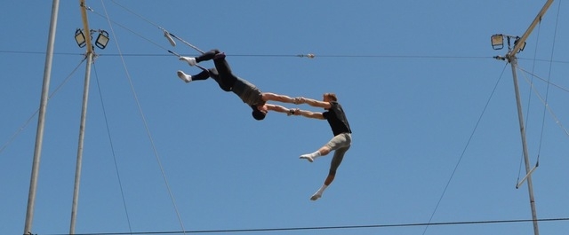 Christopher Ries catches Anthony Patrick Delaney during a Trapeze Las Vegas demonstration on Bob Christians Day May 1, 2016. Ginger Meurer/Special to View