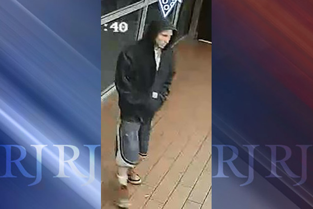 Police are seeking help finding the suspect who robbed a Domino’s Pizza restaurant on May 13. (Las Vegas Metropolitan Police Department)