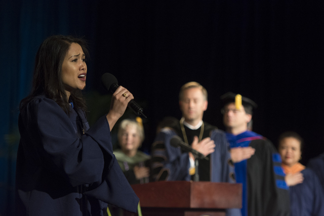 WGU Nevada graduate Cheryl White, left, sings The Star-Spangled Banner" during the school's first commencement ceremony at Hilton Lake Las Vegas Resort & Spa on Saturday, May 21, 2016. (Jason  ...