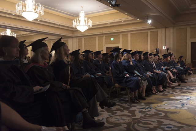 WSU Nevada graduates listen as Nevada Lt. Gov. Mark Hutchison delivers commencement address during the school's first commencement ceremony at Hilton Lake Las Vegas Resort & Spa on Saturday, M ...