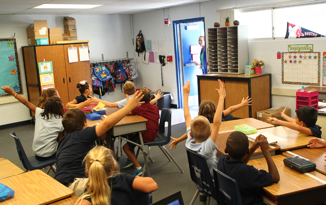 Students surprise third grade teacher Brenda Moynihan at Sewell Elementary School in Henderson on Wednesday, Sept. 10, 2014. (Chase Stevens/Las Vegas Review-Journal)