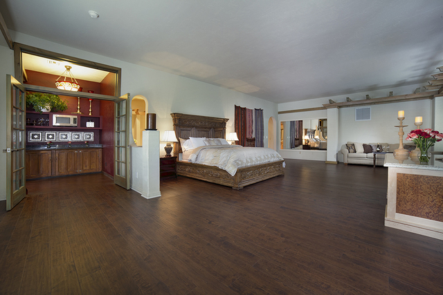 The home has a large master bedroom. (COURTESY)