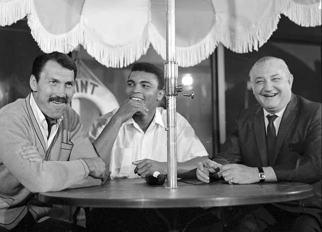 From left, actor Jack Palance, Muhammad Ali and casino owner Sam Boyd are seen at the Mint in downtown Las Vegas Nov. 4, 1965. Ali was in town for his fight against Floyd Patterson while Palance w ...