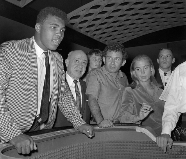 Cassius Clay, who would later change his name to Muhammad Ali, is seen at a craps table at the Dunes in Las Vegas Wednesday, July 17, 1963. (Jerry Abbott/Las Vegas News Bureau)