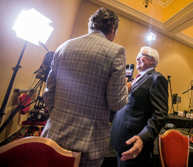 Bill Foley, right, Las Vegas billionaire businessman and owner of the new National Hockey League expansion team, is interview by Rogers SportsNet at Encore Las Vegas on Wednesday, June 22, 2016. J ...