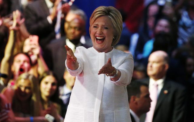 Democratic U.S. presidential candidate Hillary Clinton reacts before speaking to supporters at her California primary night rally held in the Brooklyn borough of New York, U.S., June 7, 2016. (Luc ...
