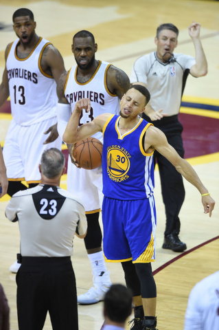 Jun 16, 2016; Cleveland, OH, USA; Golden State Warriors guard Stephen Curry (30) reacts after fouling out of the game in the fourth quarter of game six of the NBA Finals against the Cleveland Cava ...