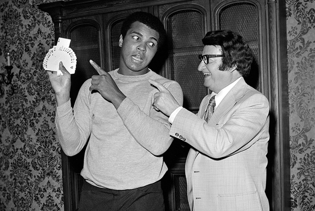 Muhammad Ali jokes with Caesars Palace house magician Jimmy Grippo May 9, 1975. (Las Vegas News Bureau)