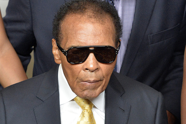 In this Sept. 27, 2014, file photo, Muhammad Ali is shown before the Ali Humanitarian Awards ceremony in Louisville, Ky. A spokesman for boxing great Muhammad Ali says the former heavyweight champ ...