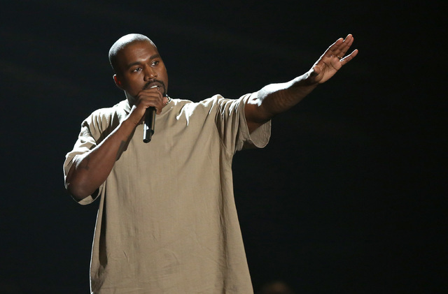 Kanye West accepts the video vanguard award at the MTV Video Music Awards at the Microsoft Theater in Los Angeles, Aug. 30, 2015. (Matt Sayles/Invision/AP)