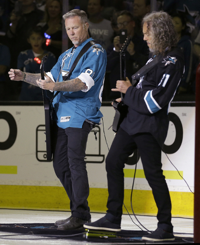 Metallica's James Hetfield, left, and Kirk Hammett perform the national anthem prior to Game 4 of the NHL hockey Stanley Cup Finals between the Pittsburgh Penguins and San Jose Sharks on Monday, J ...