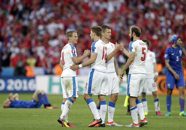 Czech Republic players celebrate at the end of the Euro 2016 Group D soccer match between the Czech Republic and Croatia at the Geoffroy Guichard stadium in Saint-Etienne, France, Friday, June 17, ...