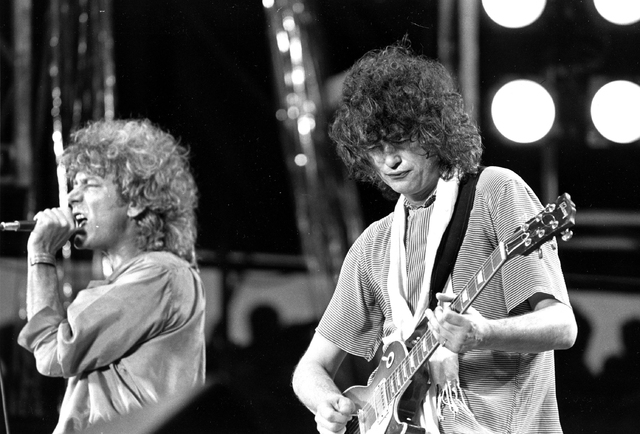 In this July 13, 1985 file photo, singer Robert Plant, left, and guitarist Jimmy Page of the British rock band Led Zeppelin perform at the Live Aid concert at Philadelphia's J.F.K. Stadium.  (Rust ...
